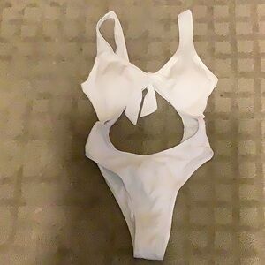 White ribbed one piece swim suite with open front and back